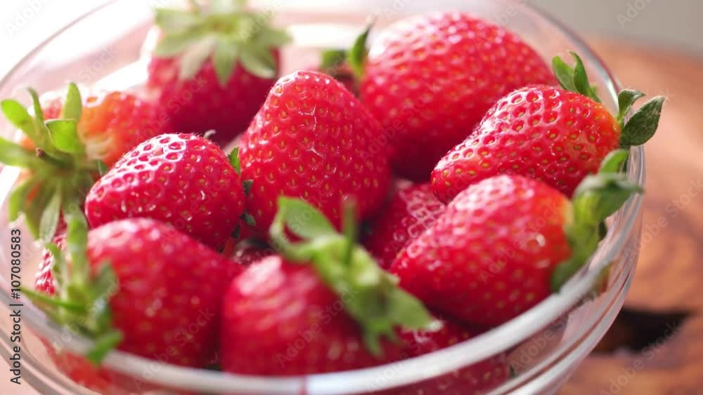 Fresh strawberries rotating with sunlight. Fresh strawberries rotating with sunlight.