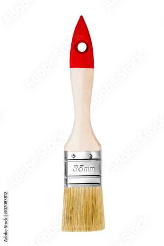New clean paint brush with a wooden handle isolated on a white background
