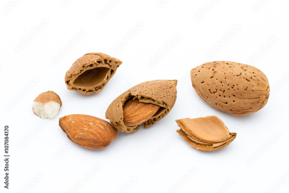 Group of almond nuts. Isolated on a white background. Group of almond nuts. Isolated on a white background.