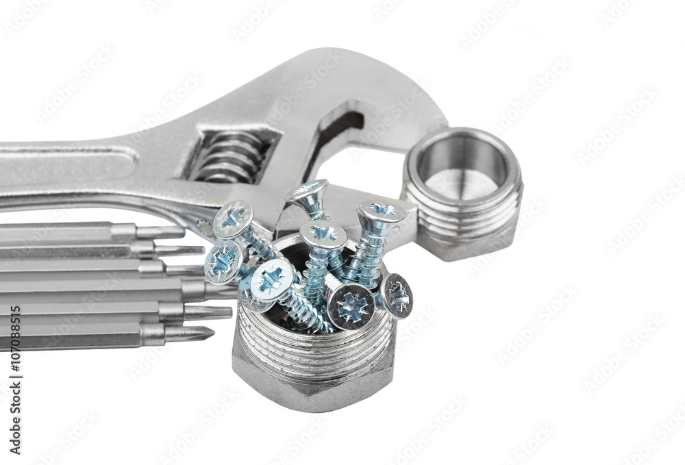 Wrench, plumbing fitting and screw Wrench, plumbing fitting and screw