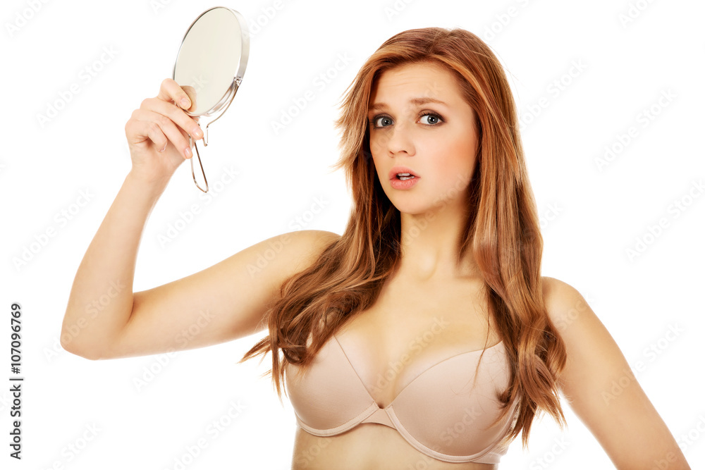 Beautiful shocked woman with a mirror Beautiful shocked woman with a mirror