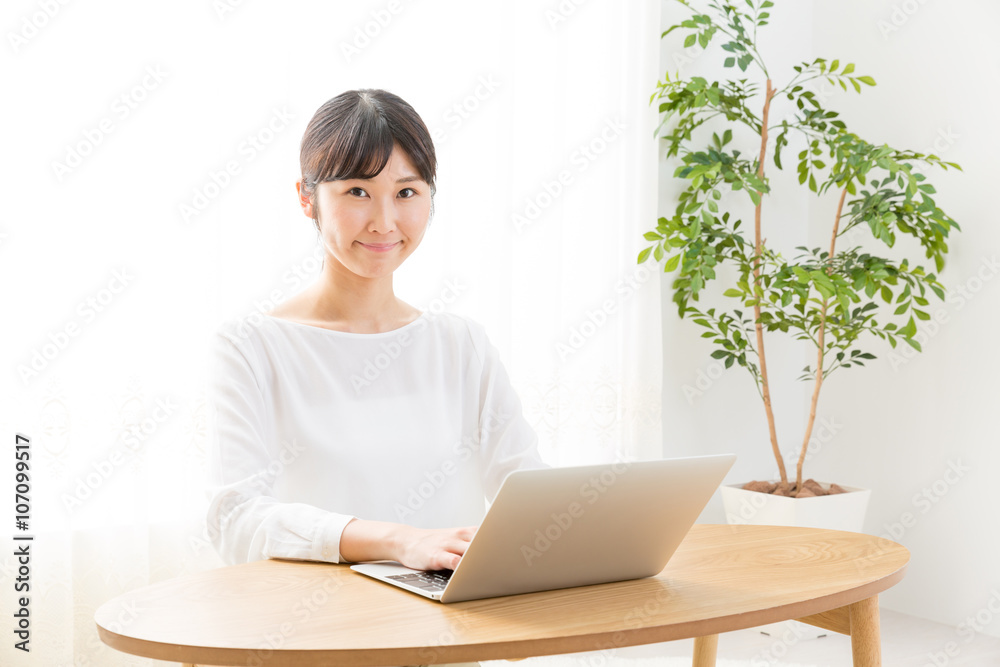 young asian woman using laptop computer young asian woman using laptop computer