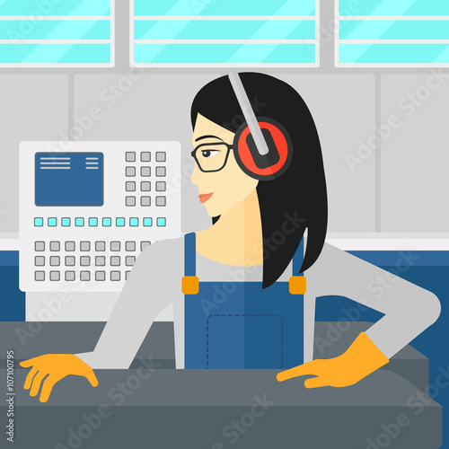 Woman working on steel-rolling mill.
