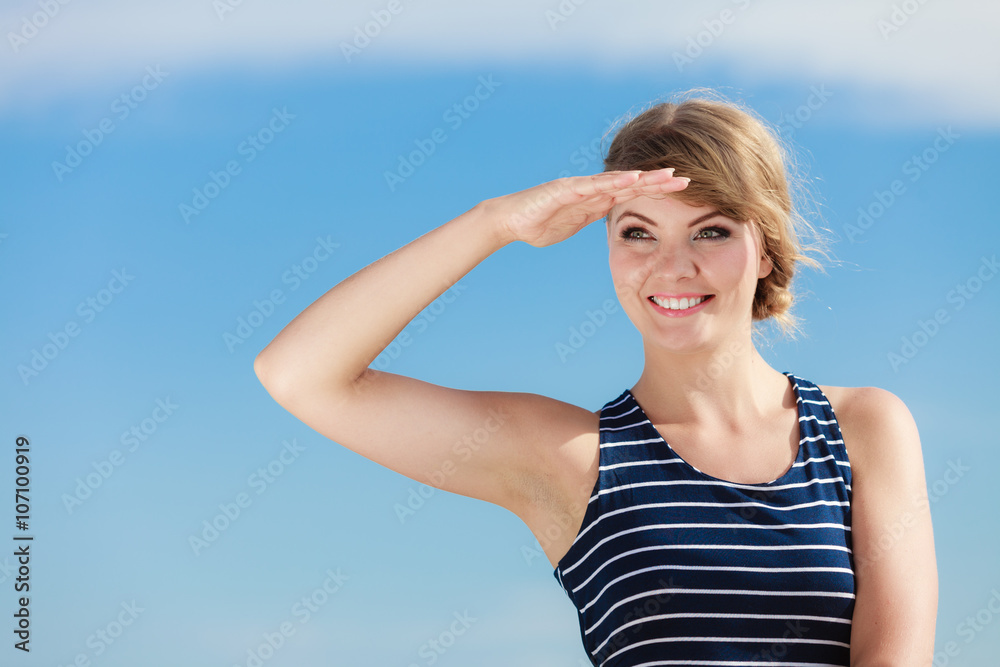 Fashion woman in striped dress outdoor. Summer.