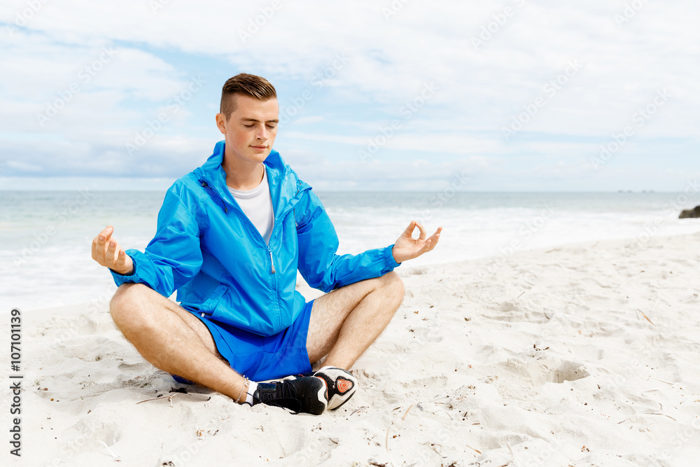 Man training on beach outside Man training on beach outside