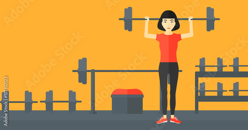 Woman lifting barbell.