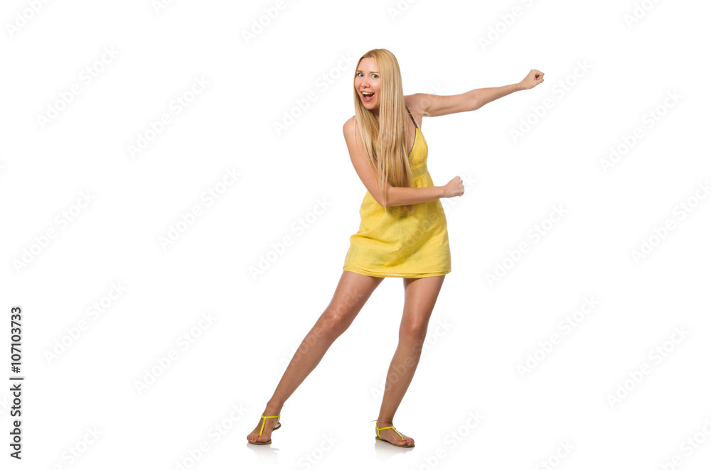 Caucasian fair model in yellow summer dress isolated on white Caucasian fair model in yellow summer dress isolated on white