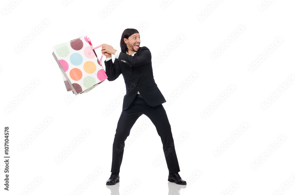Black suit man holding plastic bags isolated on white Black suit man holding plastic bags isolated on white