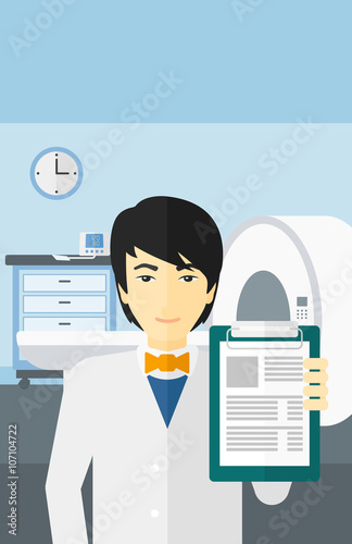 Doctor in hospital room with MRI machine.