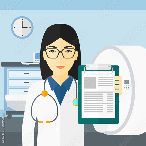 Doctor in hospital room with MRI machine.