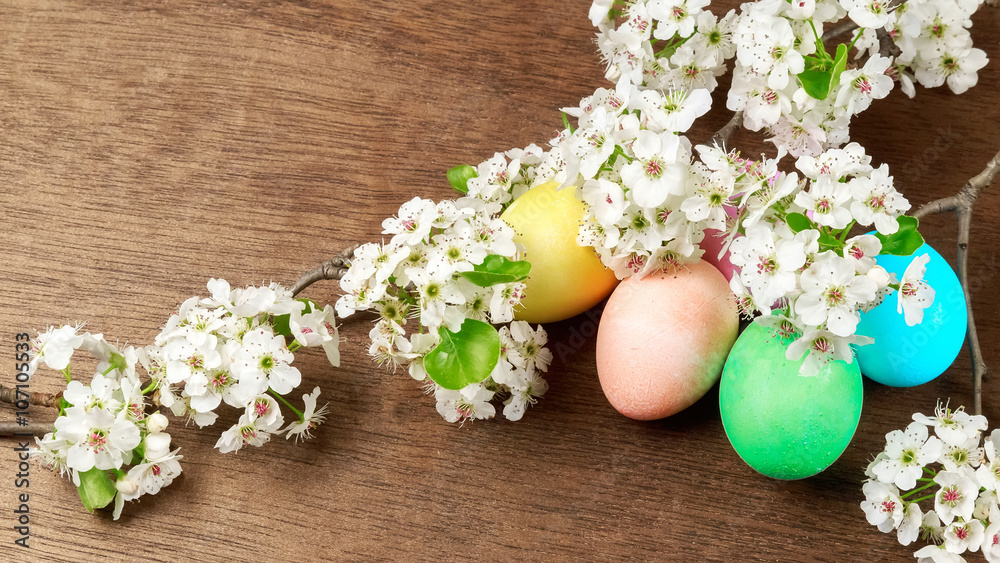 Easter eggs on a flowering tree branch Easter eggs on a flowering tree branch