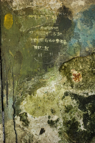 phone numbers on the wall