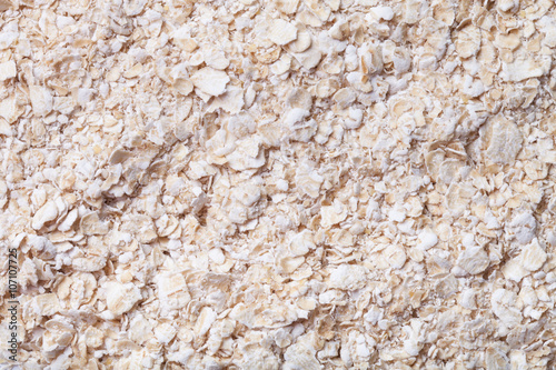 Oat flakes as texture for background © strannik_fox