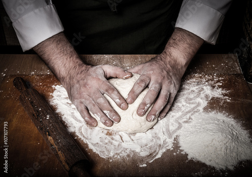 The process of making home bread by male hands. Toned