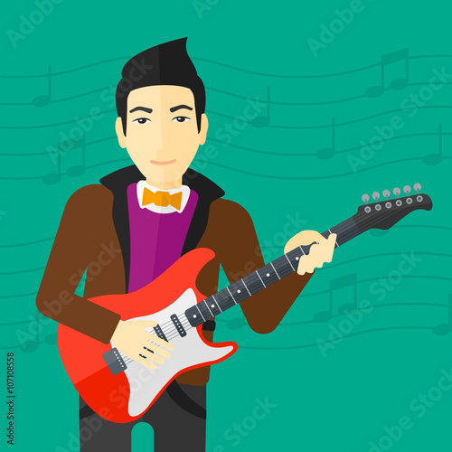 Musician playing electric guitar.