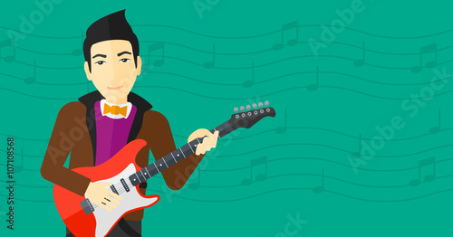 Musician playing electric guitar.