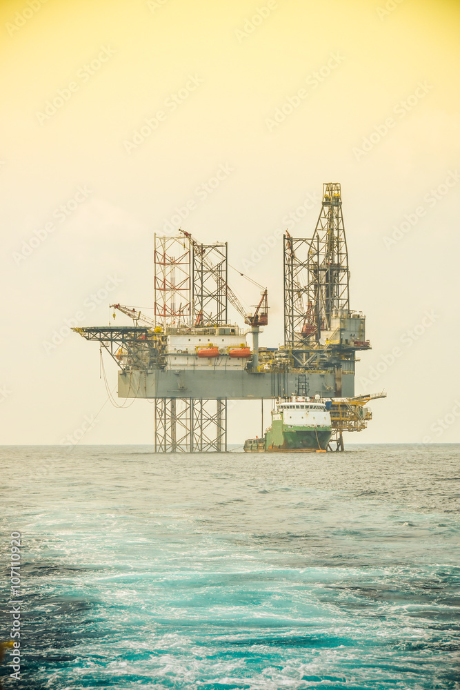 Oil and rig platform operation in north sea, Heavy industry in oil and gas business in offshore, rig operation.