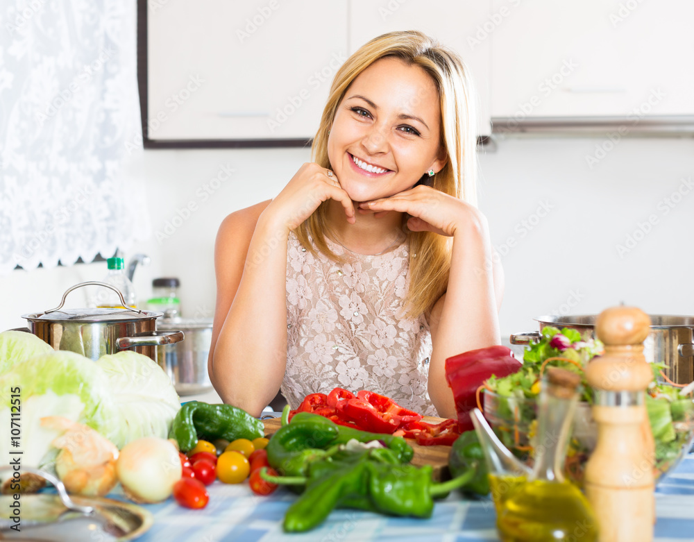 Woman cutting vegetables for dinner