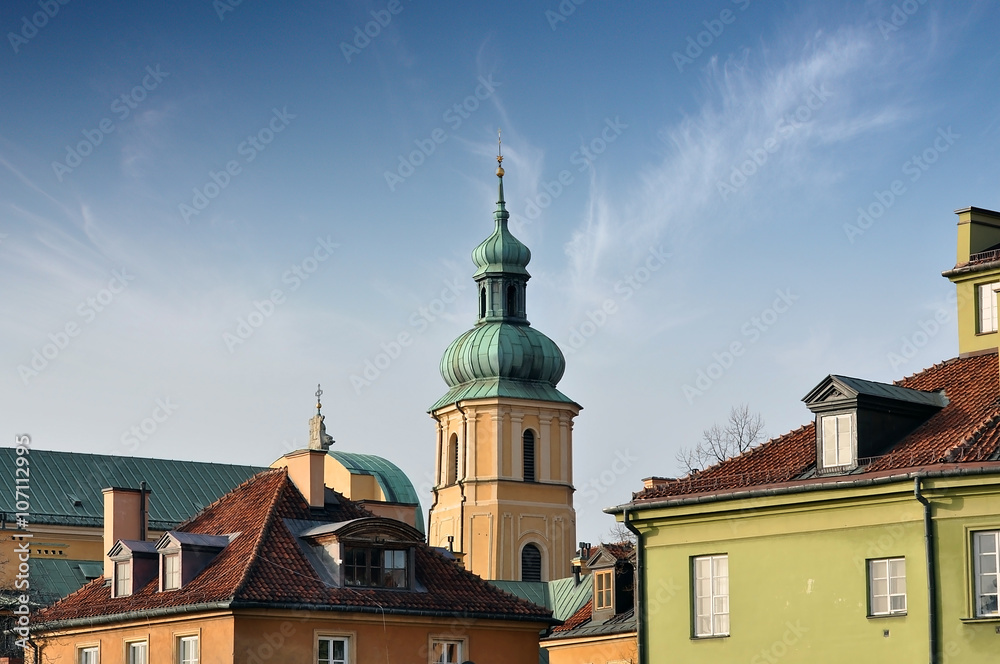 Roofs of the old houses and church in Warsaw