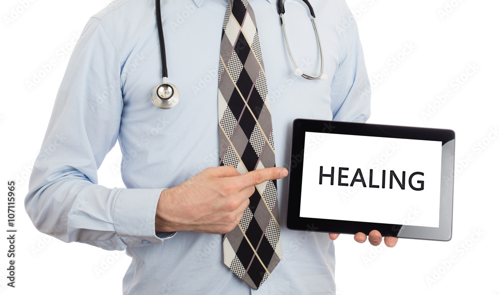 Doctor holding tablet - Healing