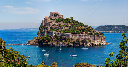 Aragon castle. Hieron I of Syracuse built the fortress in 474 B.C. In 1441 Alfonso of Aragon, rebuilt the old Castle, linking to the main island by the stone bridge. Ischia island, Italy. photo