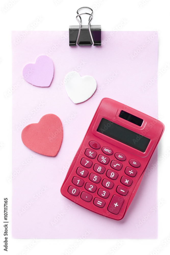 pink sheet, calculator, heart shaped and paper clip pink sheet, calculator, heart shaped and paper clip