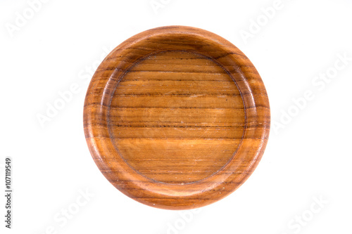 A round hand craft wooden saucer, wooden bottom plate isolated o
