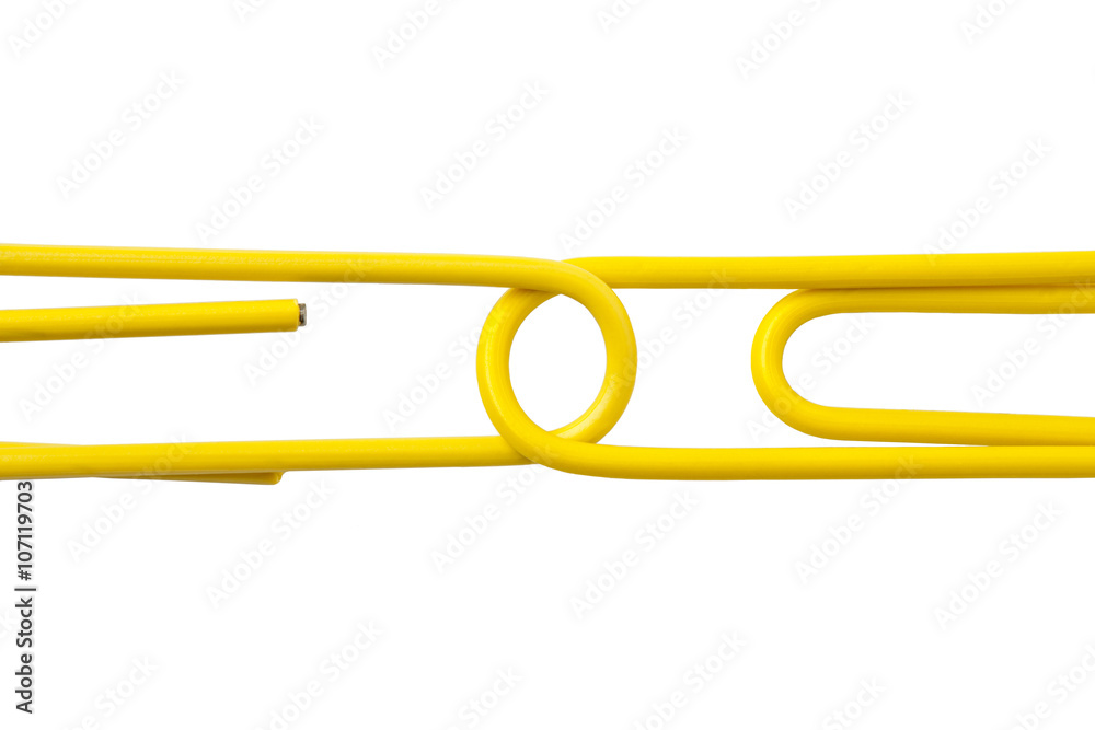 two yellow paper clips.