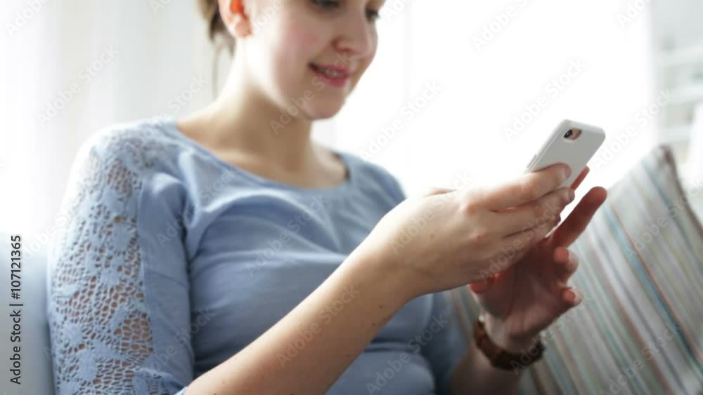 happy young woman with smartphone at home happy young woman with smartphone at home