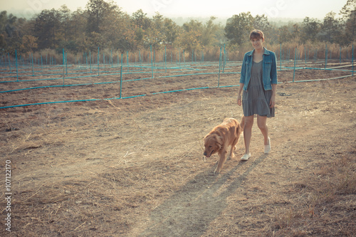 Golden retriever dog and Beautiful woman