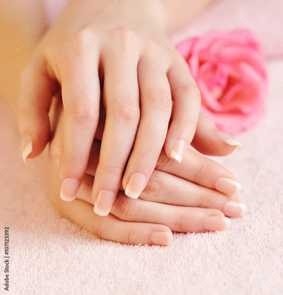 Naklejka premium Closeup image of pink french manicure