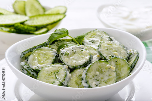 Fresh cucumber salad with yogurt and herbs.