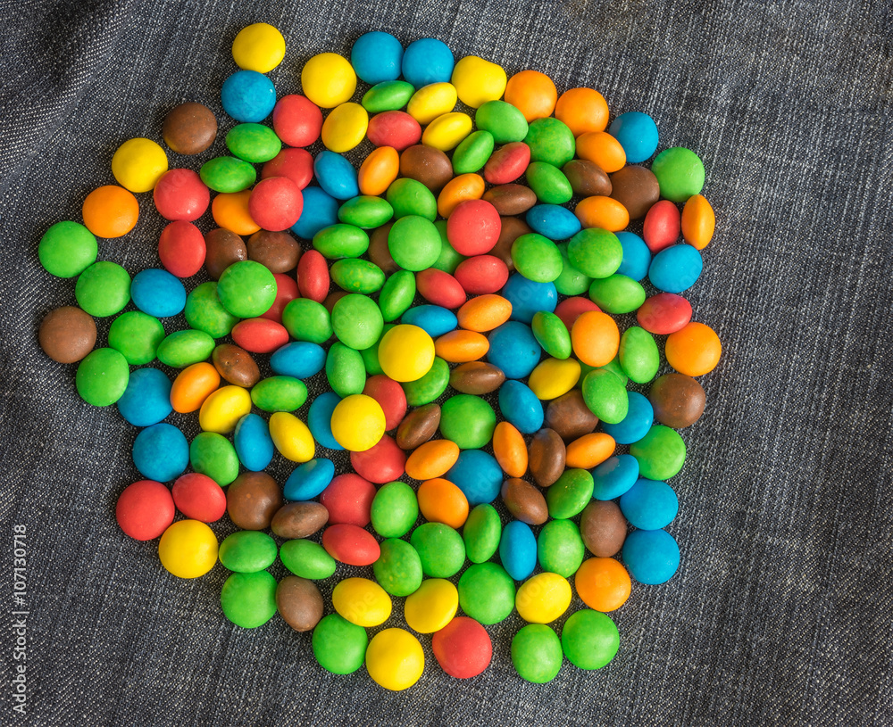 Sweet Bonbons Candy and jeans texture. Sweet Bonbons Candy and jeans texture.