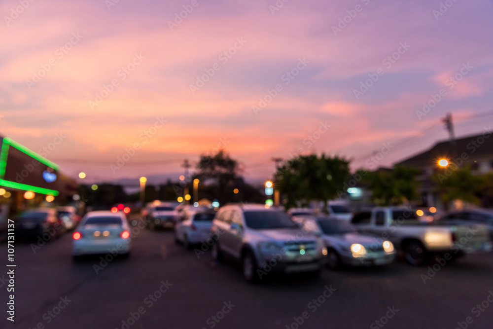 blur of colorful sky in twilight time above car park