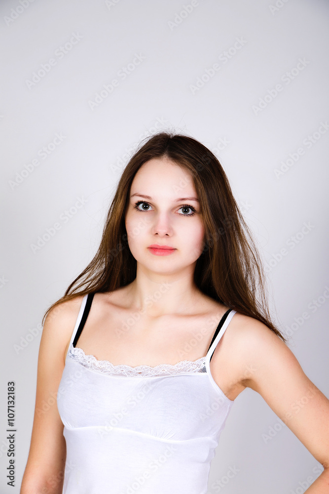 Fashionable model in jeans and white top Fashionable model in jeans and white top