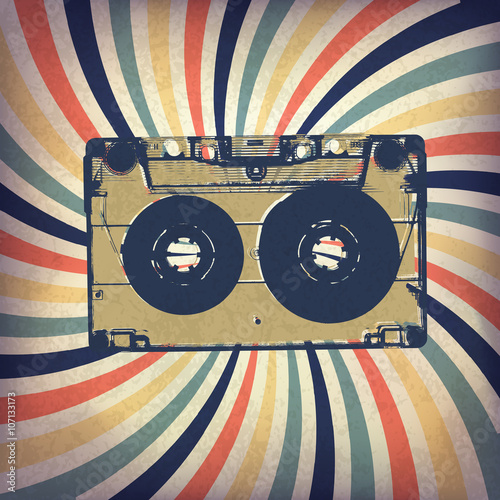 Grunge music background. Audio cassette illustration on rays