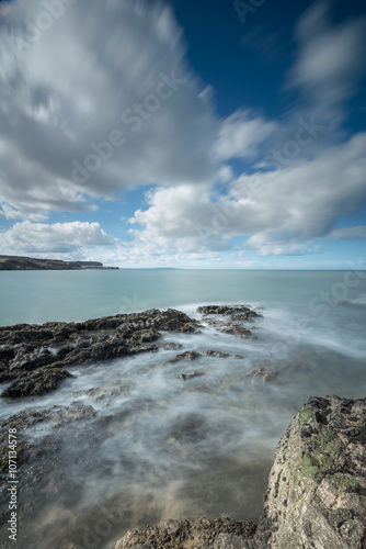 Rocks and Swirling Tide at Penmon Point, Anglesey.