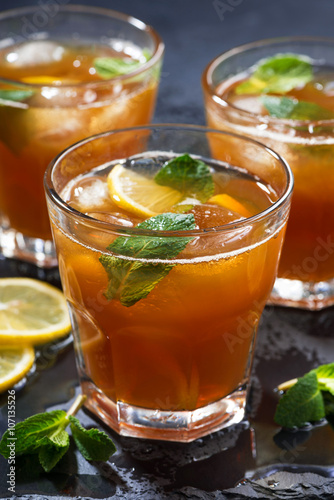 iced tea with mint and lemon, vertical