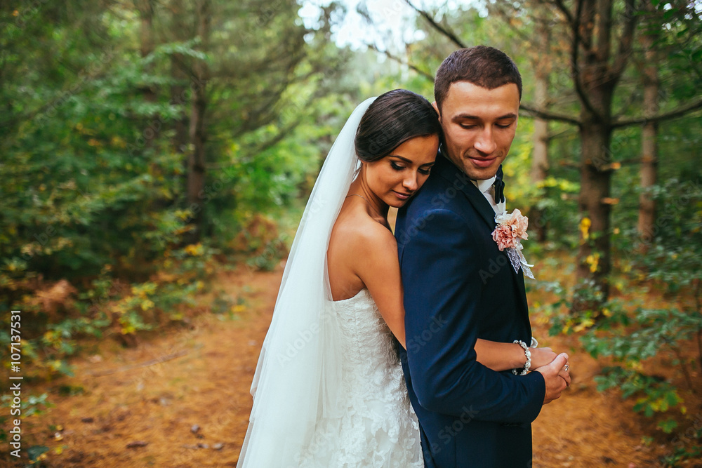 newlyweds in park.newlyweds on walk in the beautiful wood.newlyweds embrace.embraces of newlyweds.newlyweds in the spring wood.gentle.relations.feelings.beautiful groom and bride.fantastic wedding. newlyweds in park.newlyweds on walk in the beautiful wood.newlyweds embrace.embraces of newlyweds.newlyweds in the spring wood.gentle.relations.feelings.beautiful groom and bride.fantastic wedding.