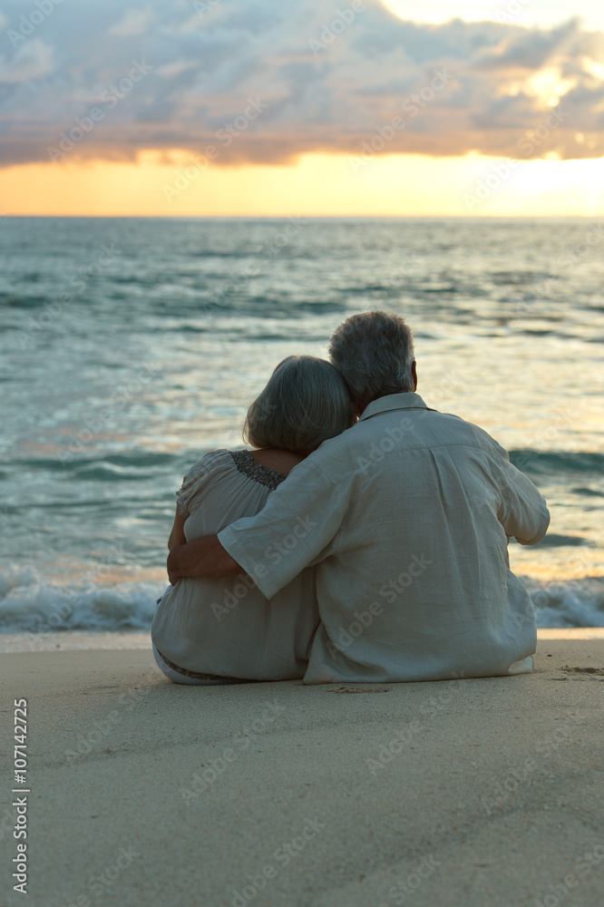 Fototapeta premium elderly couple rest at tropical beach