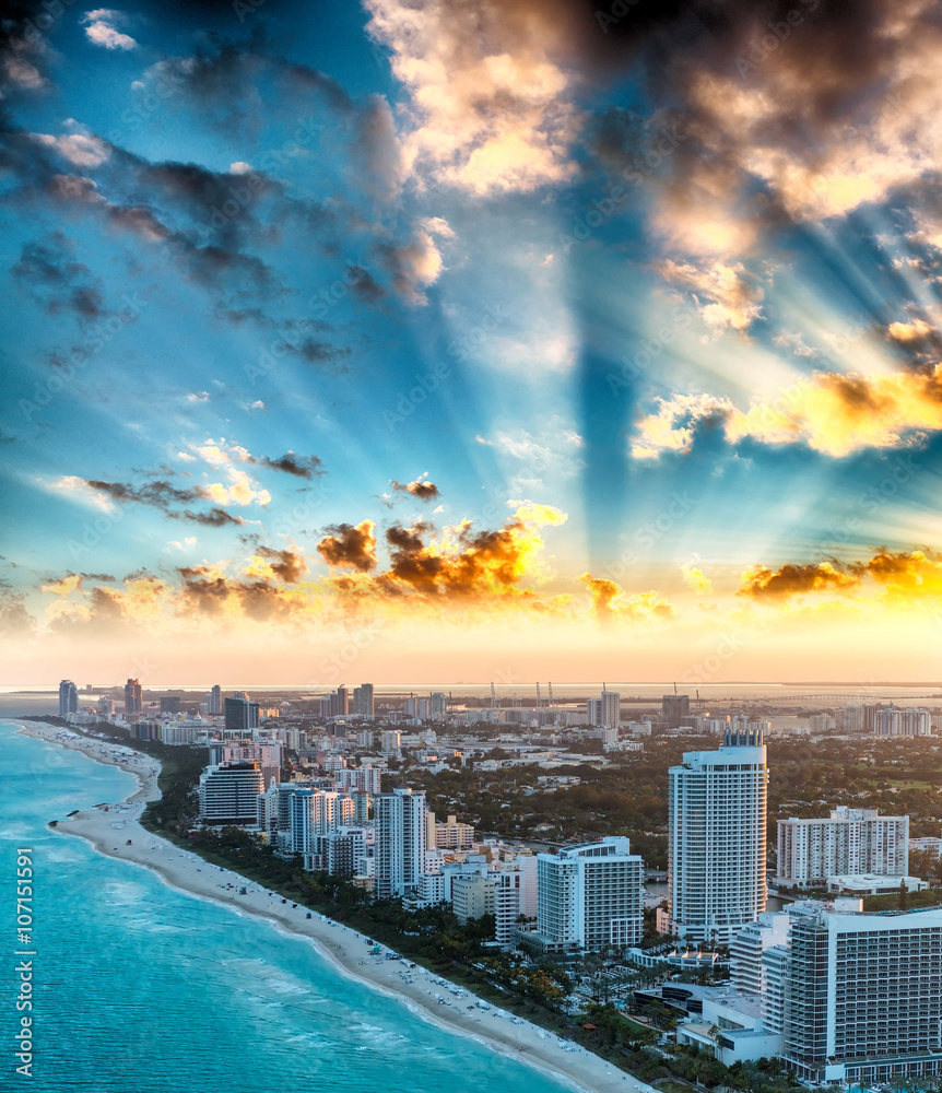 Miami Beach at sunset, aerial view from helicopter