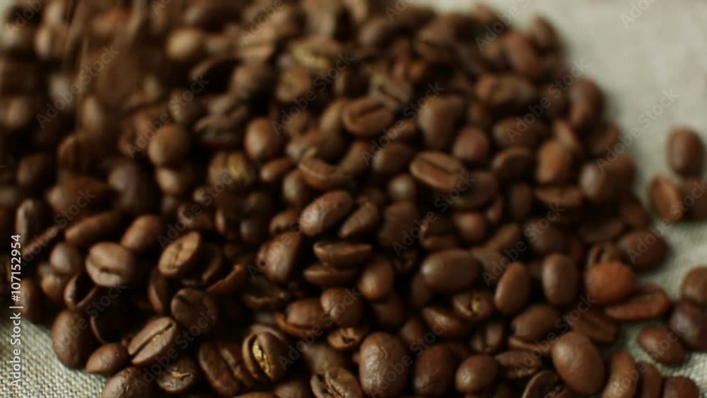 Falling aromatic roasted coffee beans Falling aromatic roasted coffee beans