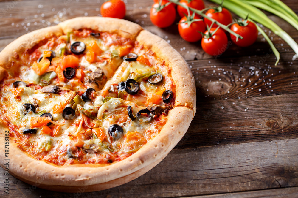 Pizza with tomato, mushroom and olives