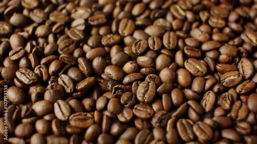 Rotation of aromatic roasted coffee beans Rotation of aromatic roasted coffee beans