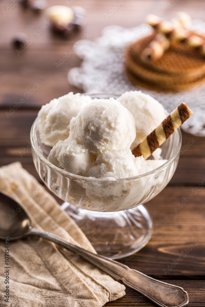 Vanilla ice cream with waffle in ramekin Vanilla ice cream with waffle in ramekin