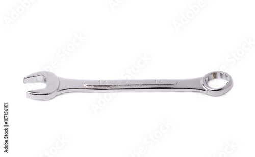 Wrench metal instrument isolated over white background © exopixel