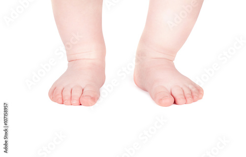 Child's feet isolated on white