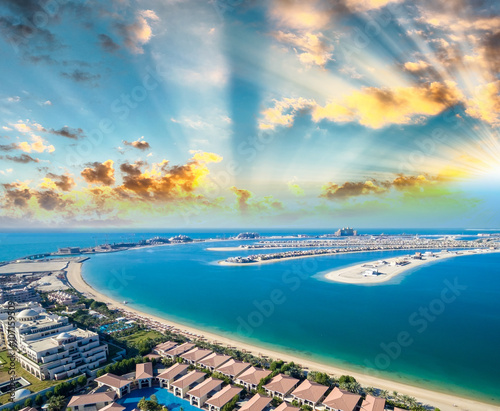 Sunset over Dubai Jumeirah Palm  aerial view