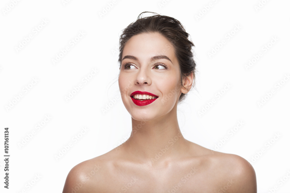 Image of a smiling beautiful girl with red lipstick over white background. Isolated Image of a smiling beautiful girl with red lipstick over white background. Isolated