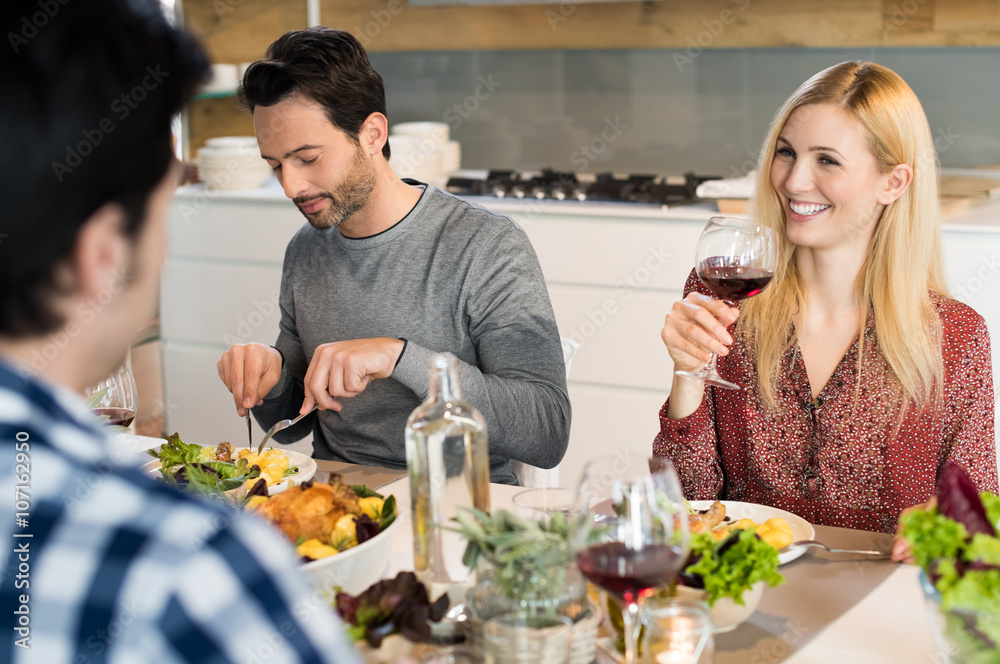 Happy friends eating together Happy friends eating together